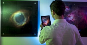 A student views stars from the observatory in the Romney Building.
