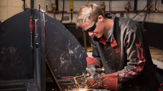 A student works in the Welding Lab.