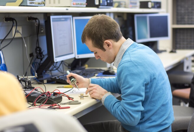 Students work and study in the Electrical Engineering labs in the Austin Building.
