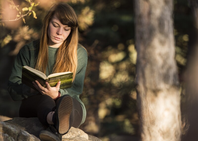 Cindy Davis studying in the Gardens