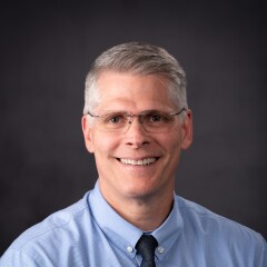 A portrait photo of Dave Harrell
