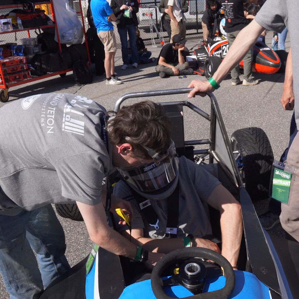 BYU-Idaho students prepare their car at the race track