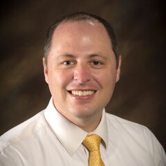 Portrait of Aaron Kay