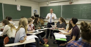 An English instructor teaches a literary interpretation class.