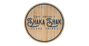Shaka Shak Logo "UNKO DWAYNE'S SHAKA SHAKA ISLAND GRINDS" written in grey with wood background.
