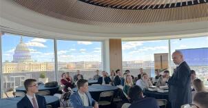 President Meredith presents to alumni at dinner hosted by the new Washington D.C. Alumni Chapter.