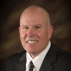 A professional photo of Faculty Brian J Atkinson.