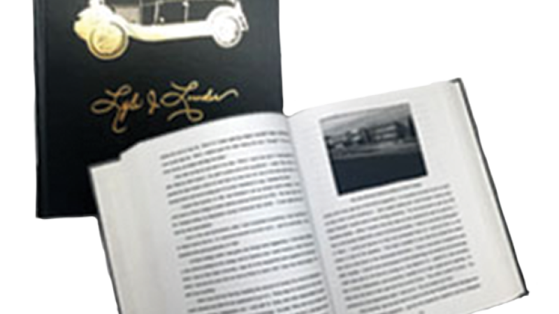 A hardbound book of family history that reads "Doc: The Great Lowder." The book is also displayed on an opened page.