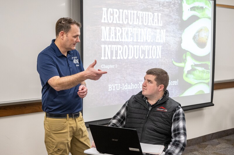 An economics student talks to a student.
