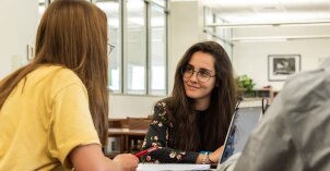Student being tutored in the reading center