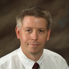 A professional photo of Adjunct Faculty Brain Call.