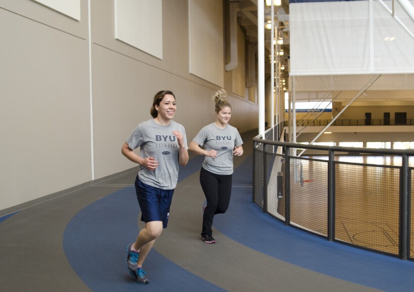 Girls running around the BYU-I Center Indoor Track