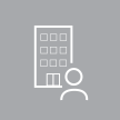 icon of a business building and a person on a gray background