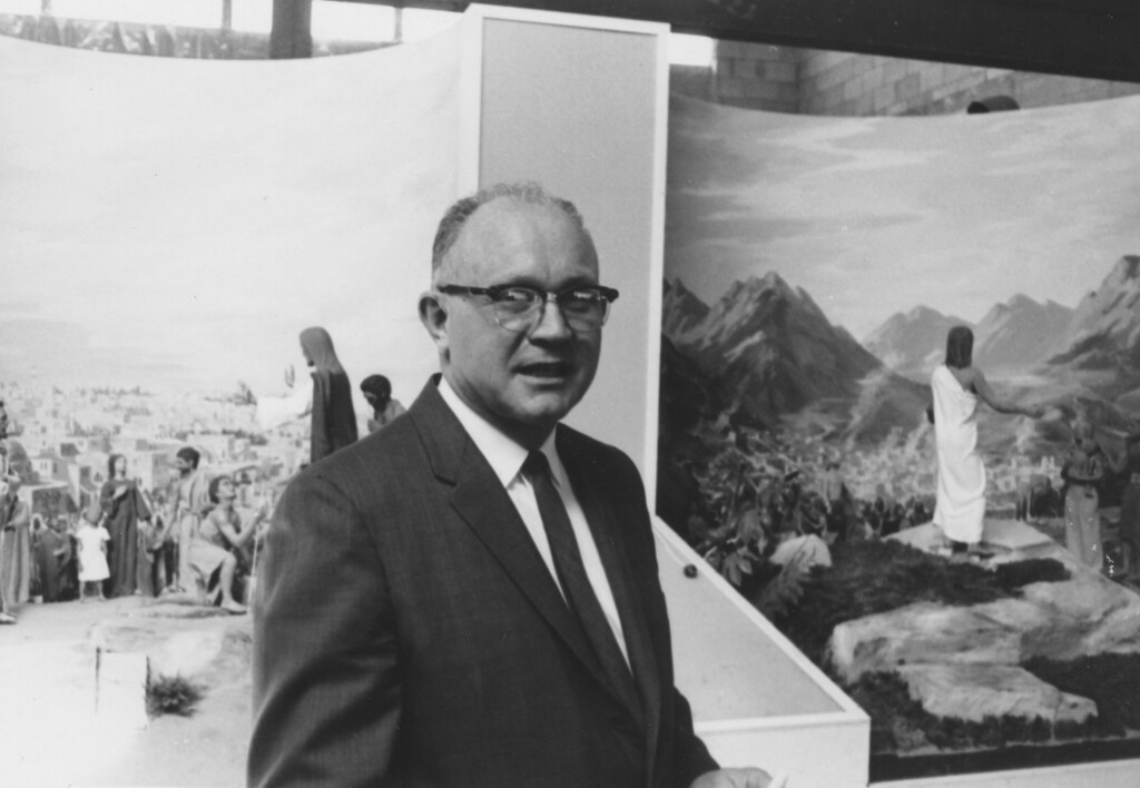 Elder Brockbank in front of Jesus Christ Diorama