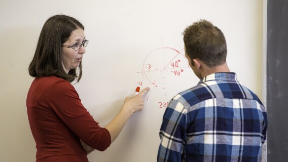 Exemplary Faculty Jen Baxter teaches a Trigonometry class in the Ricks Building.