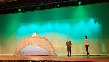Two actors on a stage