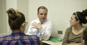 An English instructor teaches a literary interpretation class