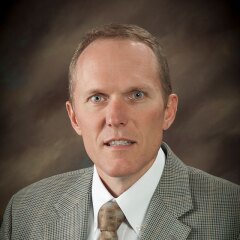 A portrait photo of Glenn Dayley