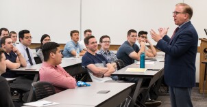 Professor Darryl Foutz instructs students in an on campus accounting course.