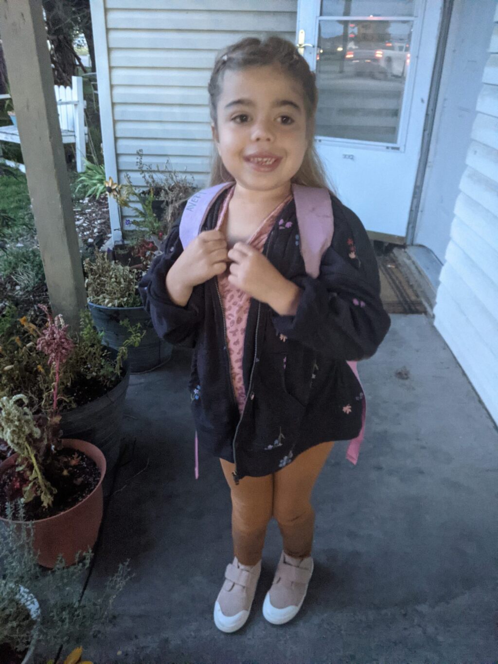 Avery Brizzee with her backpack on.