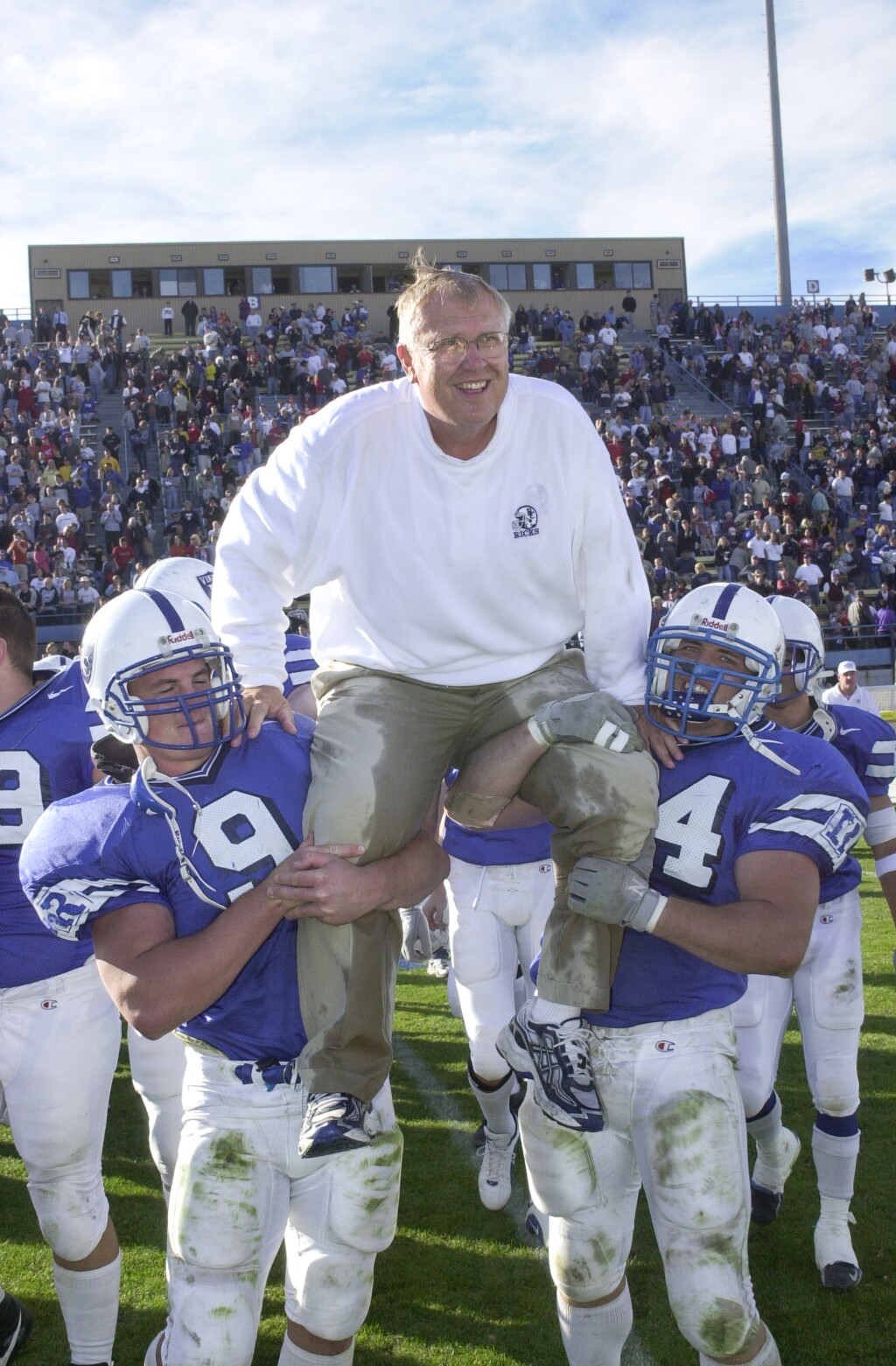 Coach Haun celebrating with the Ricks College football team in 2001
