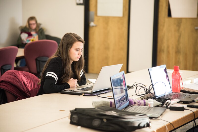 Students get back to studying in the Library.