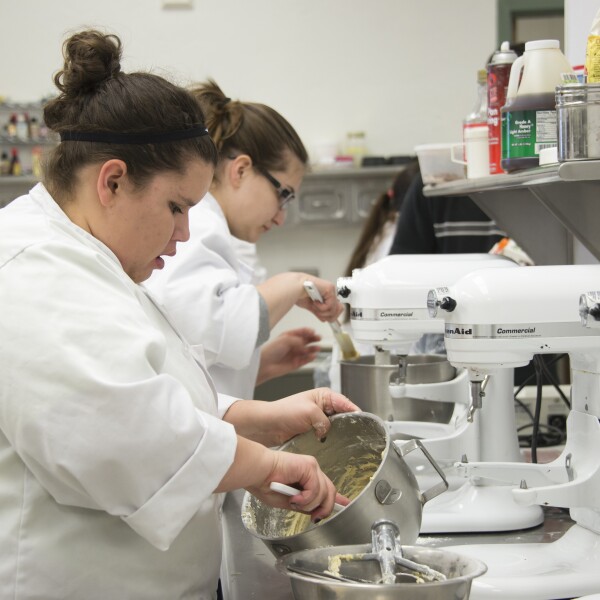 Students prepare food for taste testing in the Food Science Lab. This new major teaches students the science behind everyday foods.