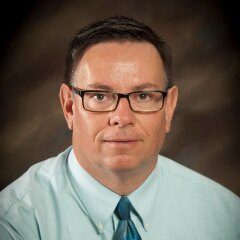 A portrait photo of Jack Harrell