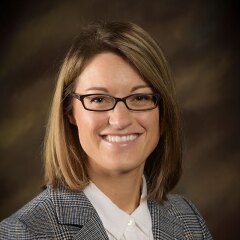 A professional photo of Faculty Shae Warnick.