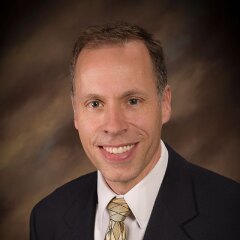 A portrait photo of Justin Miller.