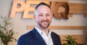 A photograph of John Pearson, an alumnus who works at Pet IQ.