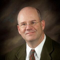 A professional photo of Instructional Media Developer Tim Tanner.