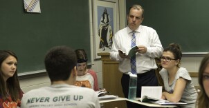 Students and a professor in a Literary Interpretation Class discuss a novel.