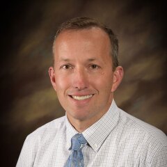 A professional photo of Faculty Kody Keller.