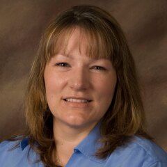 A portrait photo of Anne Papworth