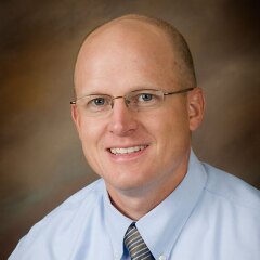 A portrait photo of Jim Richards