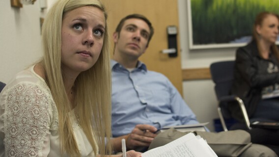 Students taking notes in their Social Psychology class.
