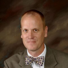 A professional photo of Faculty Scott Franson.