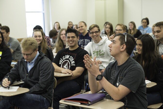 Students in an Interdisciplinary Studies class participate in a discussion.