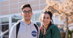 Two BYU-Idaho students smiling at the camera.