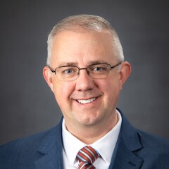 A portrait photo of David Barrus