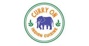 Curry On Logo "CURRY ON INDIAN CUISINE" written in orange; purple cartoon elephant centered with words surrounding it; two green leaves on each side of elephant; white background with green outline.