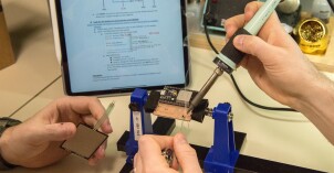 Students using a soldering iron