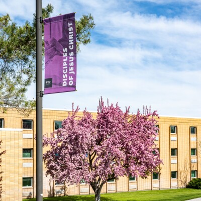 Disciple of Jesus Christ banner outside of the Rigby Hall in the springtime