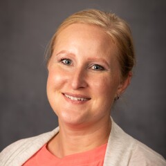 A professional photo of Office Manager Elizabeth Hill.