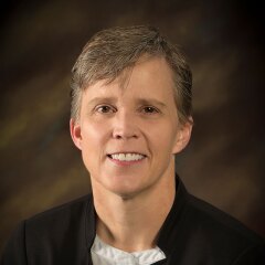 A portrait photo of Janine Gilbert