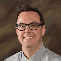 A professional photo of Faculty Mike Laughead.