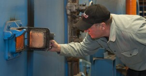A BYU-Idaho employee checks a boiler plate on the BYU-Idaho campus.