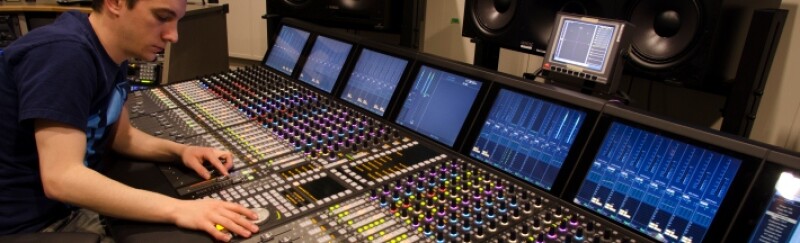 Student works in the Audio control room.