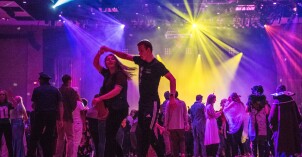 Students dance during the Spooktacular Halloween party on campus